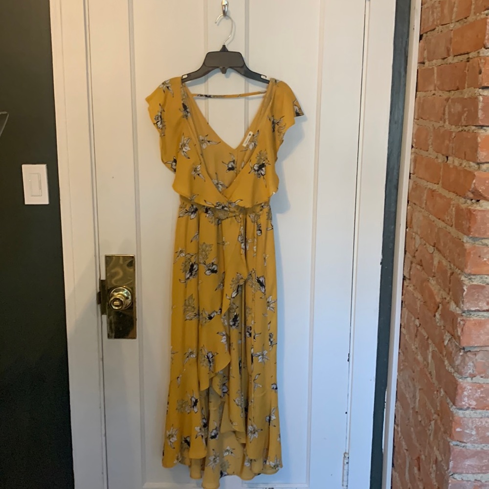Yellow dress with black and white floral pattern